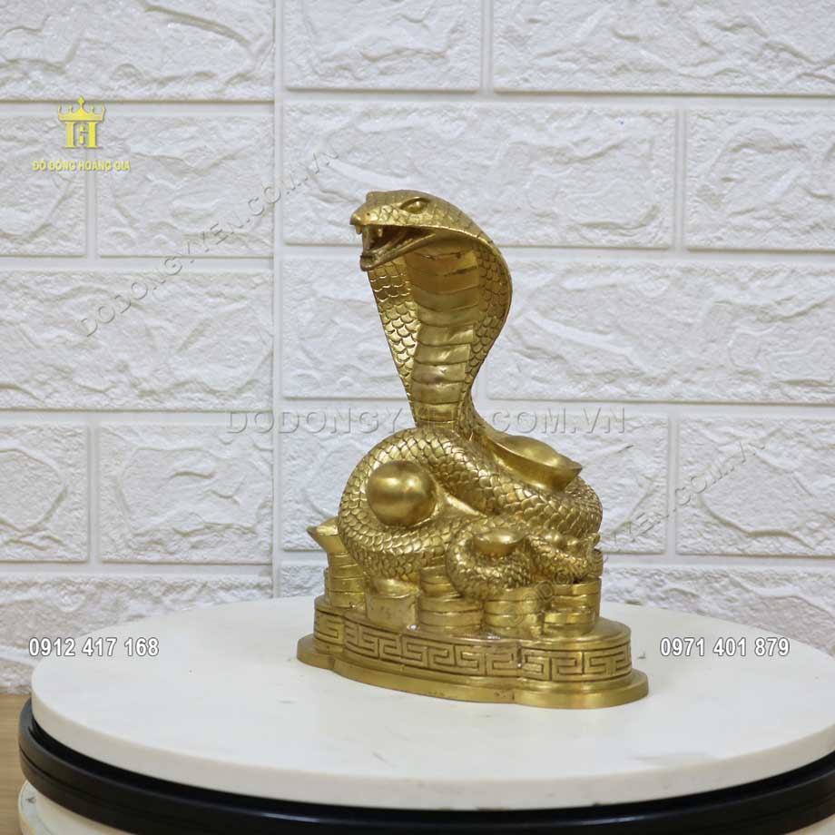 Pho tượng rắn đúc nguyên khối bằng đồng vàng thanh khiết