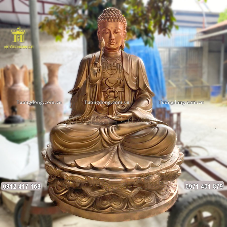 Pho tượng Đức Phật A Di Đà bằng đồng đỏ màu nhũ với diện mạo đẹp